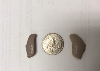 Showing the scale size of hearing aids